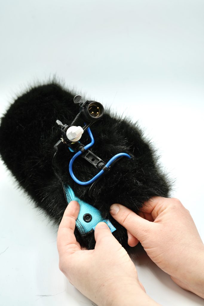 Interior view of Cinela COSI-S windshield system showing internal construction and microphone mounting