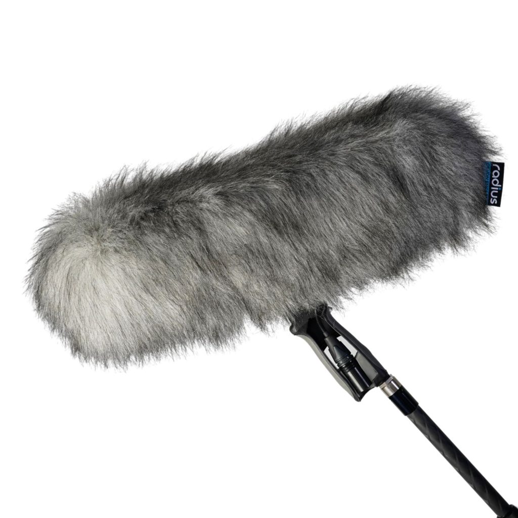 Close-up view of acoustic fur texture and drawstring attachment
