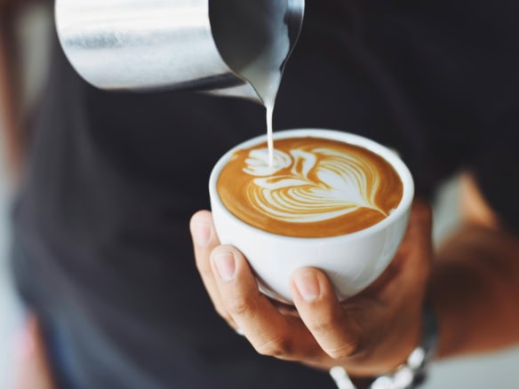 Coffee in cup with Heart design