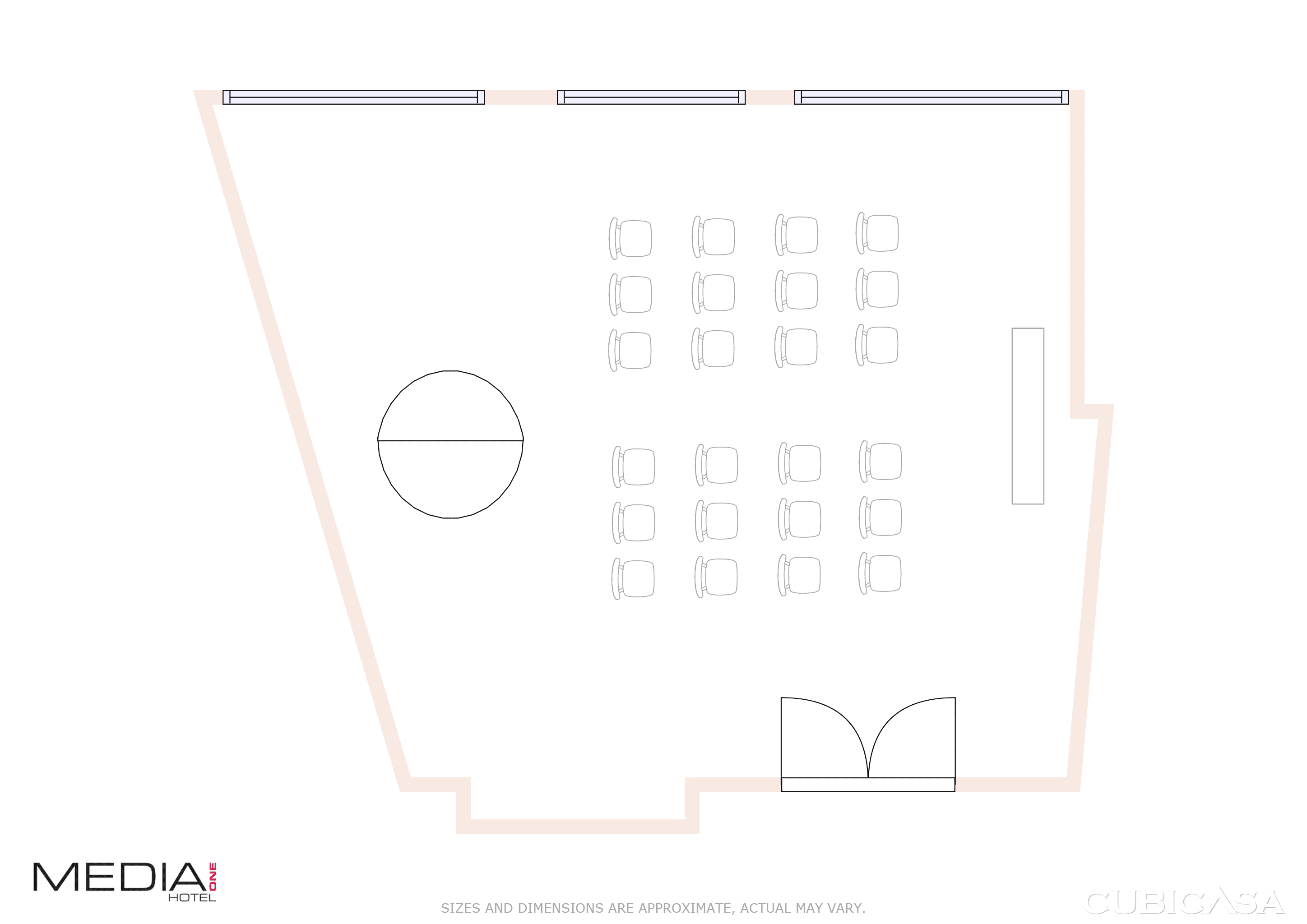 Theatre-style seating layout of Brainstorm room at Media One Hotel, with rows of chairs facing the front.