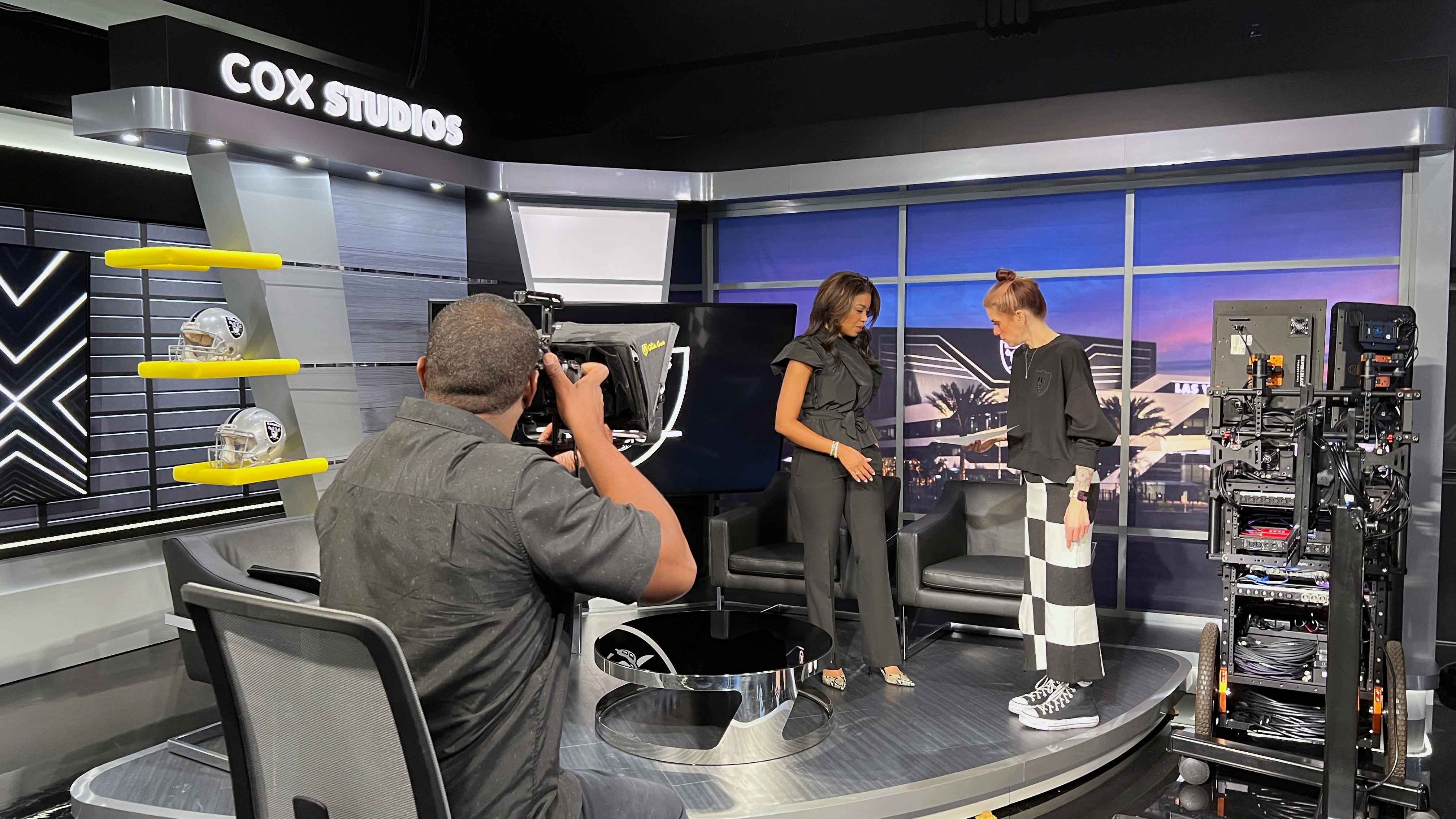 Professional corporate video production crew filming an interview in Las Vegas