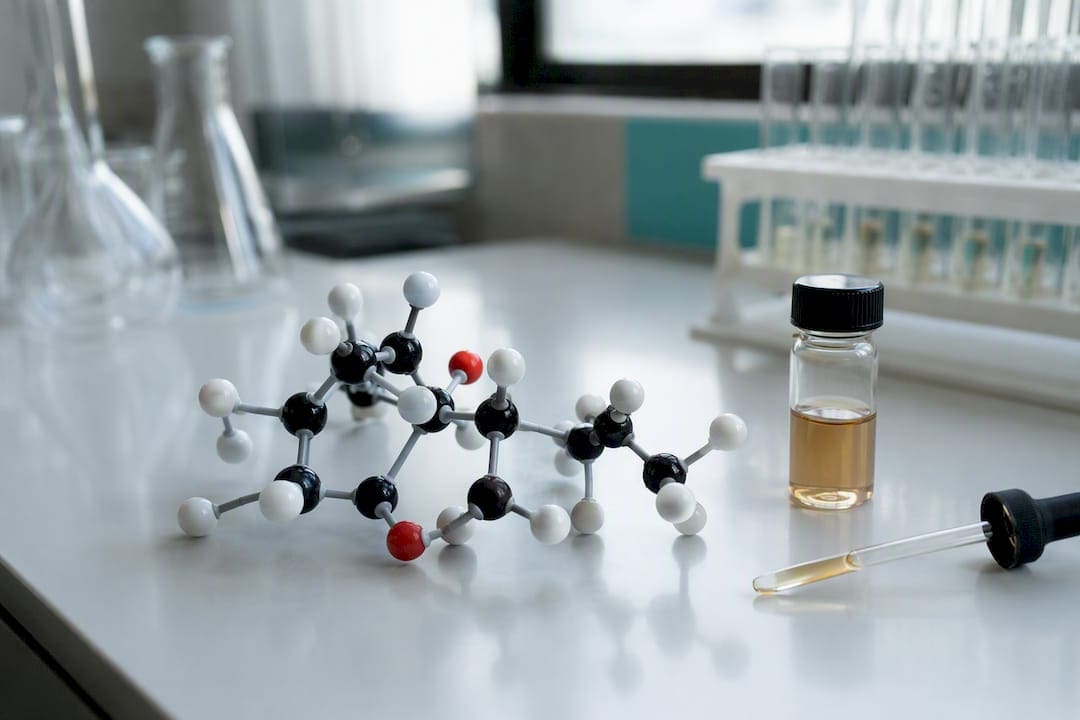 THC molecular model and lab glassware
