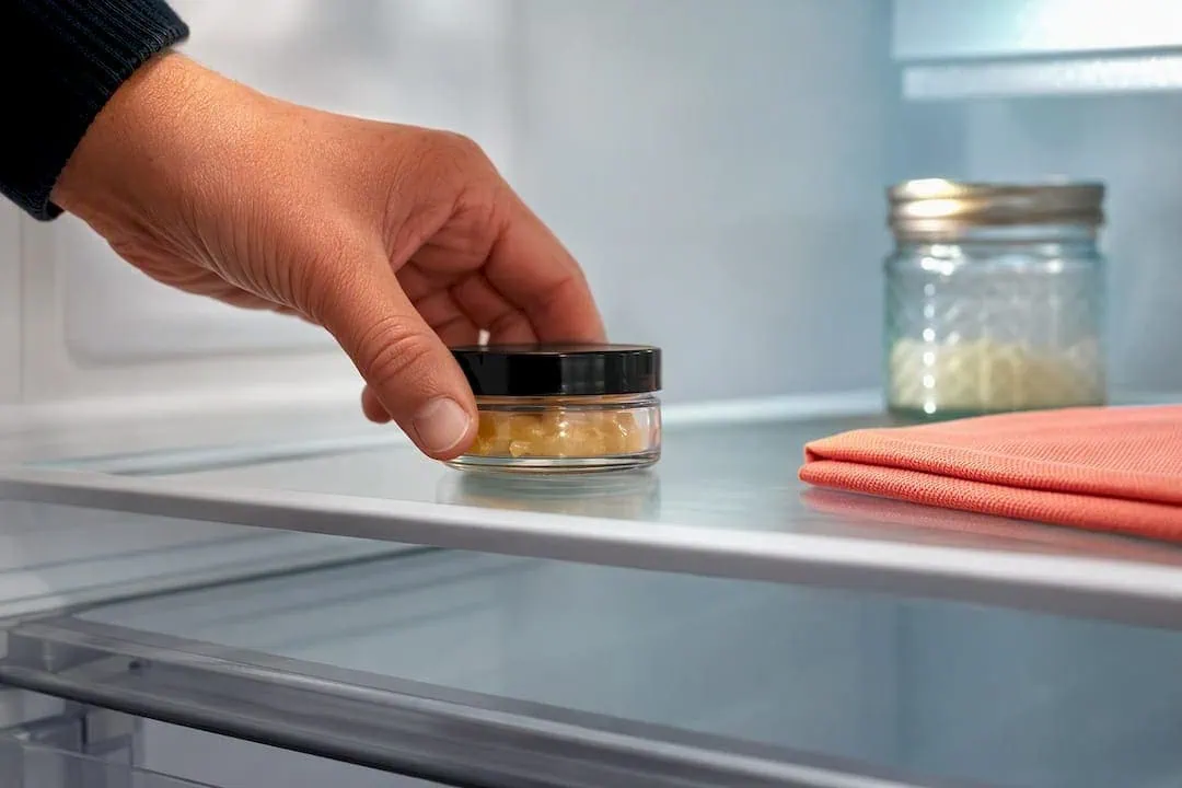 Anonymous concentrate container stored in refrigerator