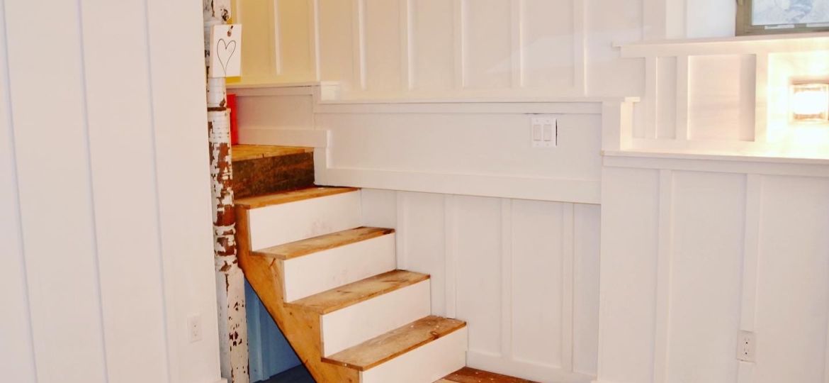 Basement stairs. There's an opportunity for under the stairs storage.