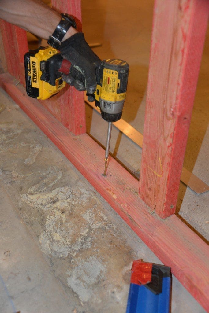 Spax DIY Projects How to frame a basement Framing basement walls accurately MyFixitUpLife DIY Projects framing basement walls how to frame a basement finish Mark MyFixitUpLife