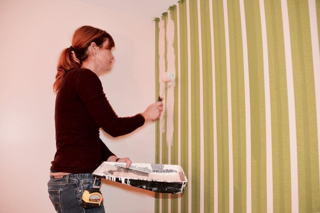 2015 MyFixitUpLife 12 Nursery Theresa paints stripes 1 4 No Demo DIY Ways to Easily Improve Your Home MyFixitUpLife Theresa painting stripes Frogtape no demo DIY MyFixitUpLife