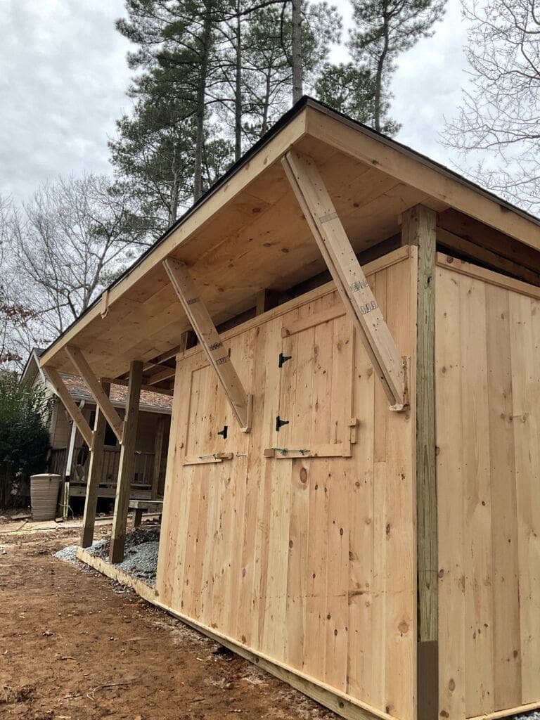 Horse barn building posts AFTER shed portion MyFixitUpLife How to Build a DIY Horse Shelter Pole Barn MyFixitUpLife MyFixitUpLife How to build a pole barn and DIY horse shed MyFixitUpLife