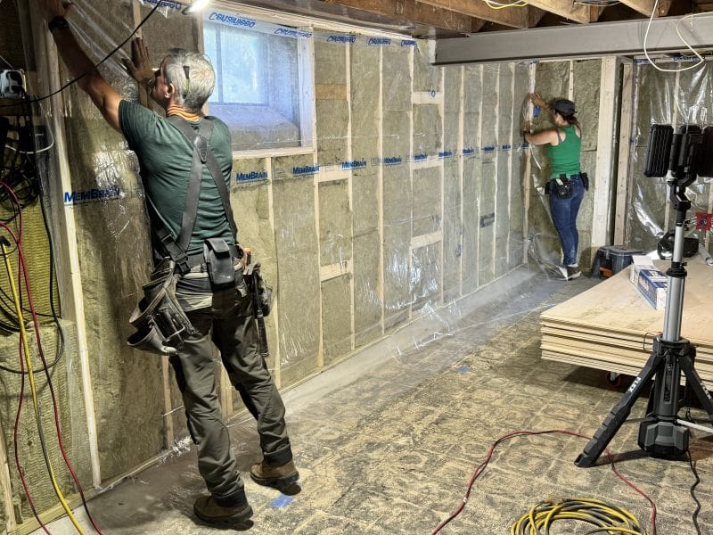 Mark and Theresa install Rockwool insulation and Membrane plastic sheeting 4 Easy Home Improvements that Save Time Money and Effort MyFixitUpLife Mark and Theresa install Rockwool insulation and Membrane plastic sheeting