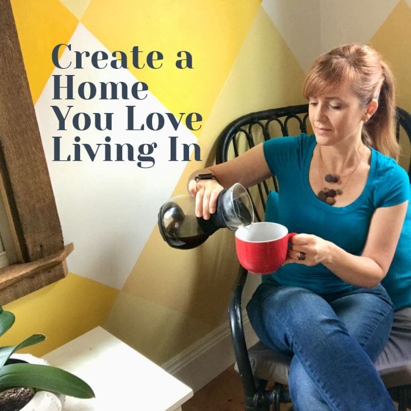 HerFixitUpLife Create a Home You Love Living in HerFixitUpLife MyFixitUpLife MyFixitUpLife Woman in a teal shirt pours coffee from a pot into a red mug beside a geometric yellow wall 2 Woman sits in a chair and pours coffee into a red mug with a yellow geometric wall behind 3 Teal shirted woman pouring coffee into a red mug in a cozy colorful room 4 Lifestyle shot showing a person pouring coffee wall reads Create a Home You Love Living In 5 A casual home scene woman enjoying coffee as a decorative wall backdrop is visible MyFixitUpLife