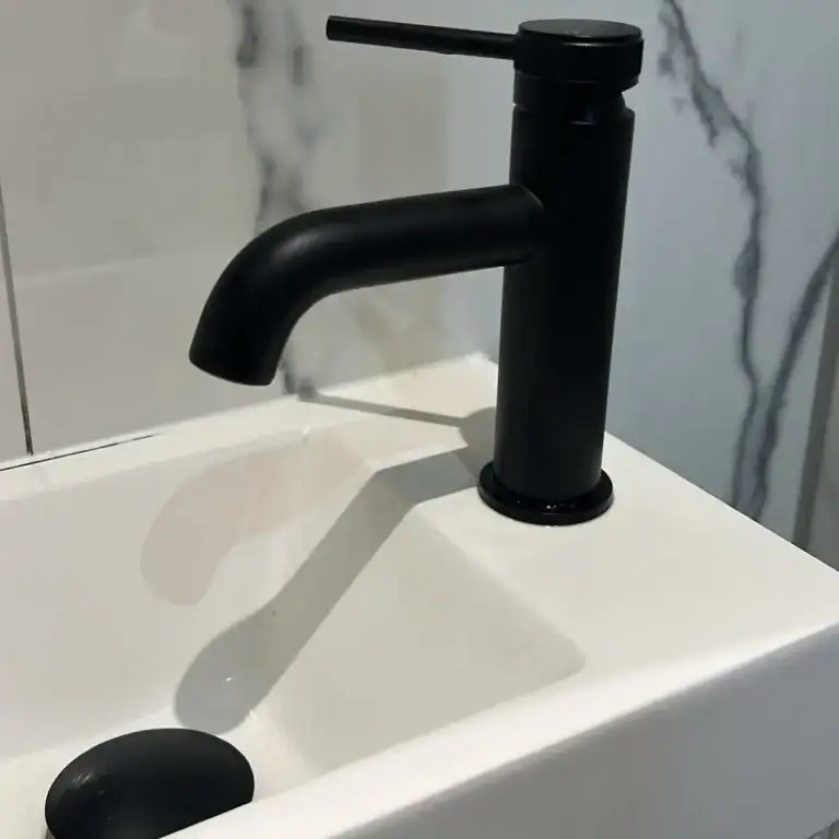 NB Gas & Plumbing, Glasgow plumber, matte black basin tap installation Glasgow, mono basin mixer tap, cloakroom sink fitting, black bathroom tap replacement.