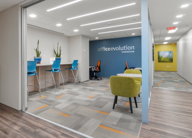 Office evolution franchising office space at Herndon location, modern coworking environment for entrepreneurs and small businesses.