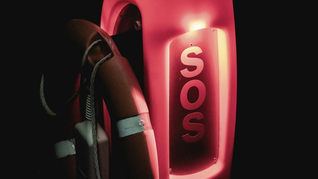 A lifebuoy with the words SOS