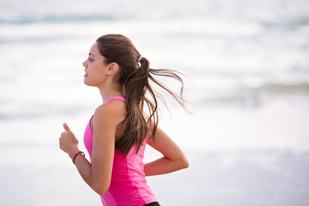 A woman running, wanting to get faster