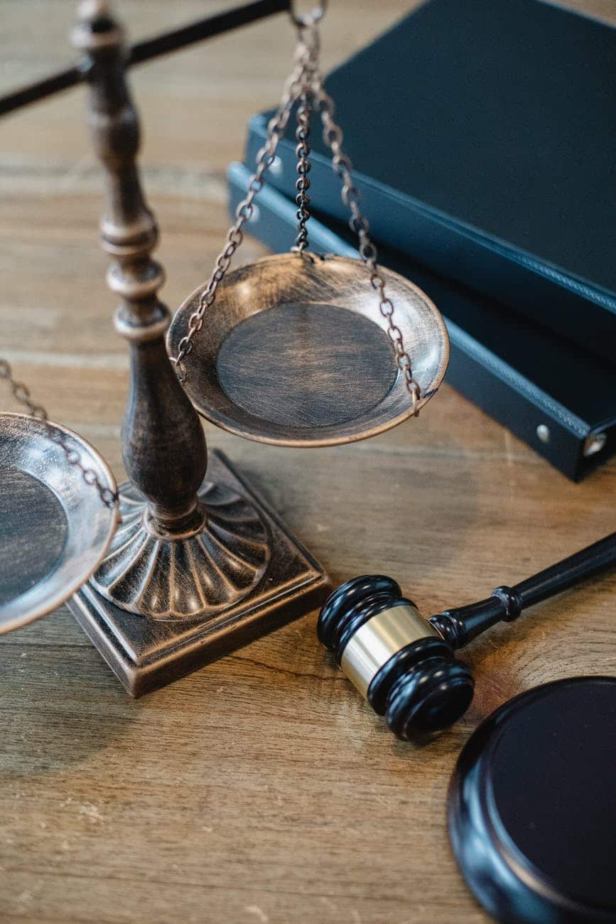 A gavel and a set of justice scales