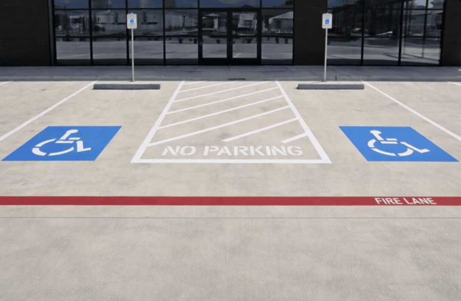 ADA accessible parking stall ISA symbol pavement marking North Houston TX | Podium Pavement Works