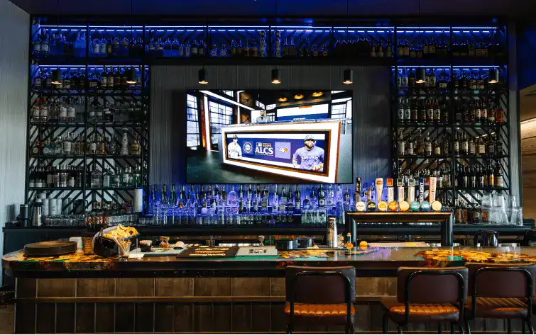 Large 12x7ft LG DVLED signage installation for high-impact golf entertainment venue solutions.