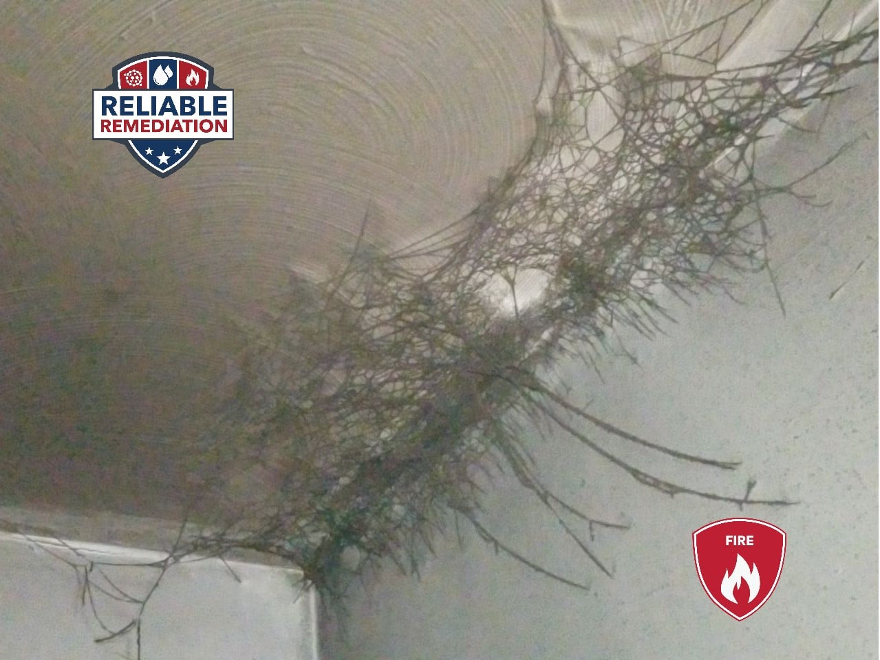 Soot webs on ceiling after a furnace puffback in Eastern CT