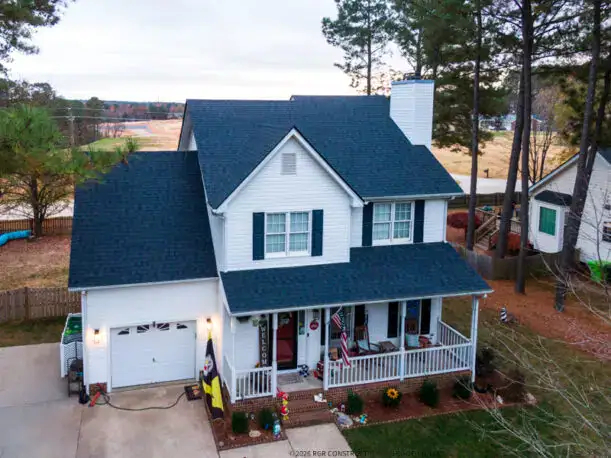 Roof replacement in progress in Hampstead NC by RGR Construction & Roofing, local roofing contractors installing a new residential roofing system.