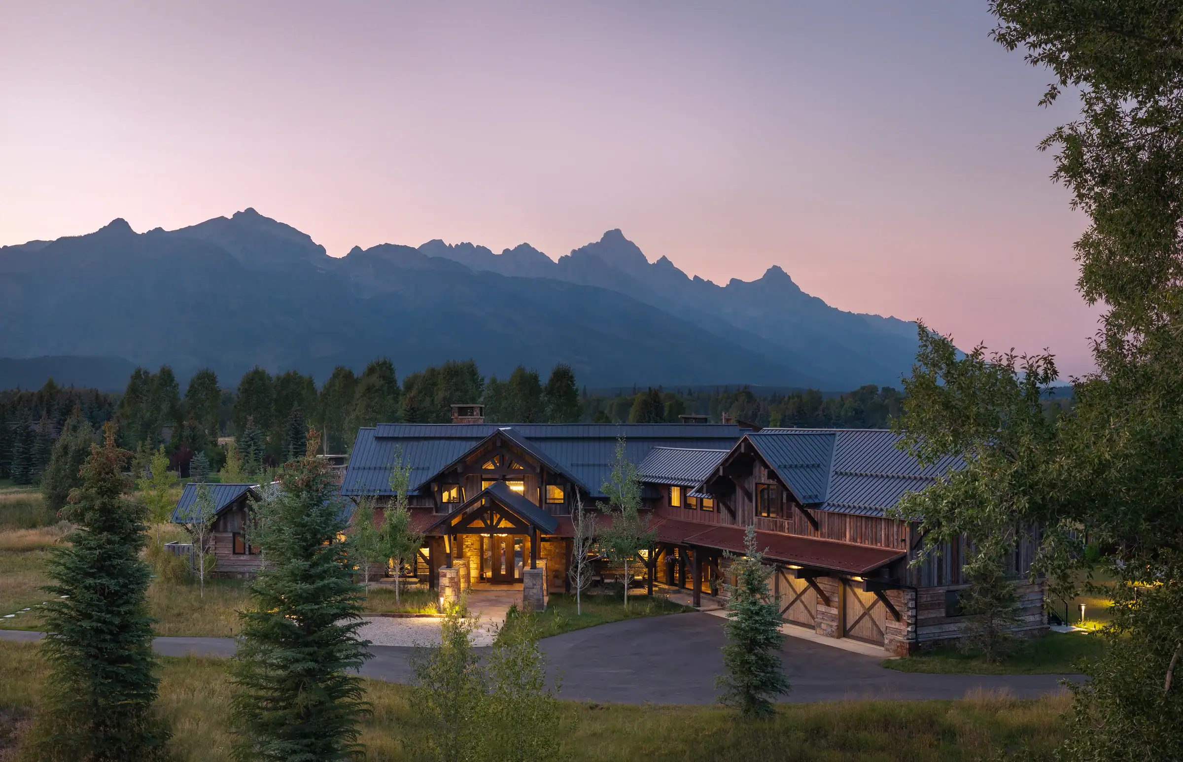 Avalanche Canyon compound at twilight beneath the Teton range