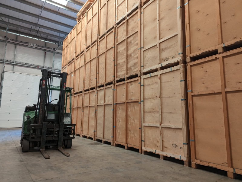 high wall of industrial storage with forklift