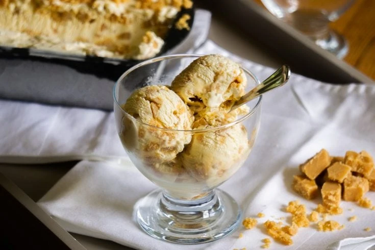 Tablet Ice Cream Recipe in a glass with tub and tablet next to it