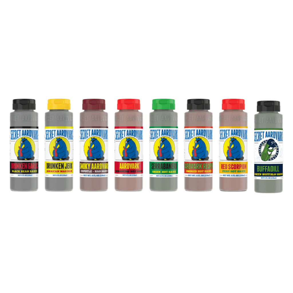 Line up of combo Aardvark 8: : Bottle of Black Bean sauce, Smoky Aardvark, Serrabanero, Habanero, Red Scorpion, Reaper,buffadill