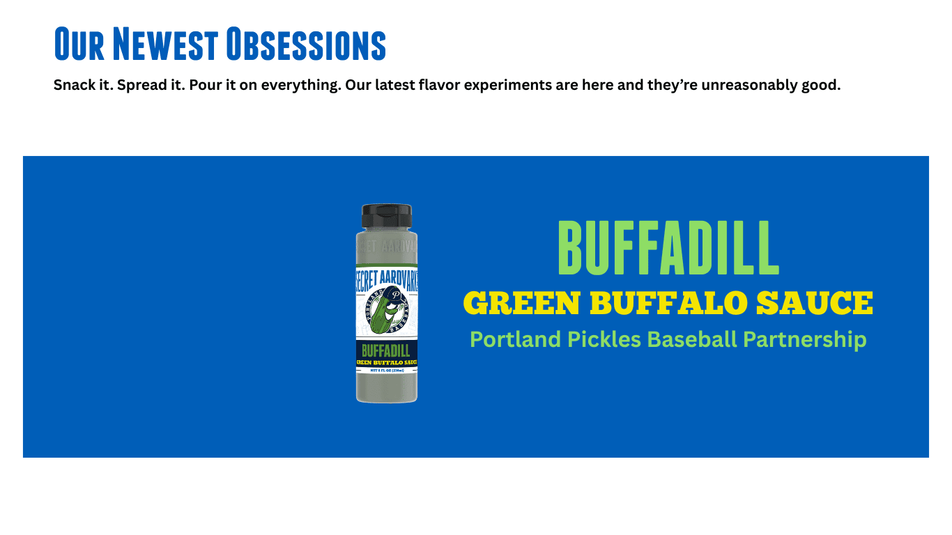 Blue background with bottle of BuffaDill Green Buffalo Sauce. Portland Pickles Baseball Partnership