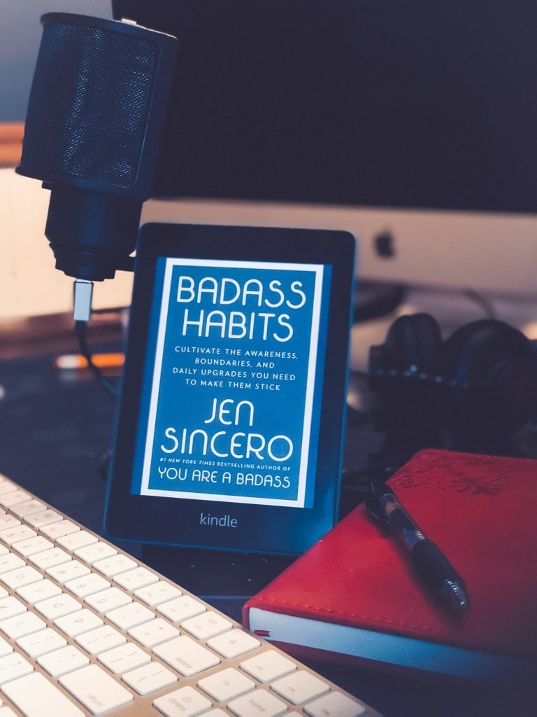 A Kindle device with the cover of Badass Habits on the screen