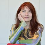 Porträt von Ismene Schell, Mitglied des Awareness- und Raumhaltungsteams beim sexpositiven Retreat Selbstsein.