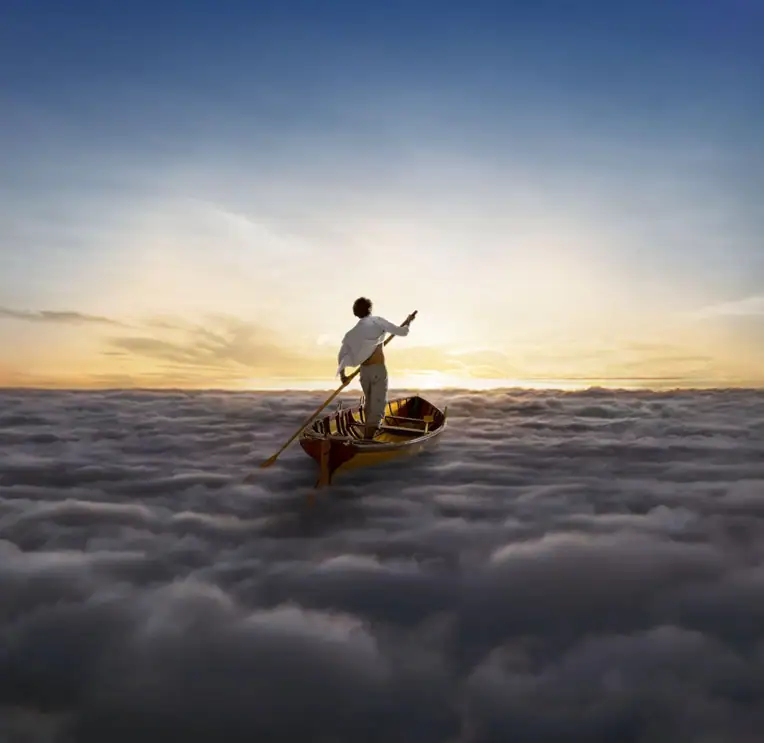 The Endless River cover with a man rowing through clouds toward bright light