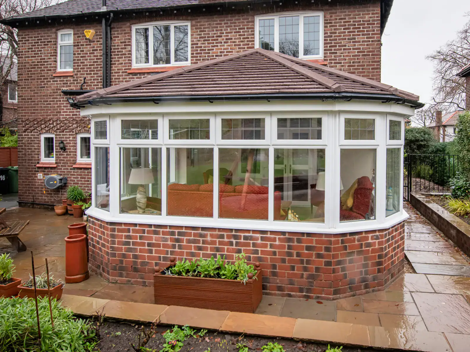 conservatory in front of a open lawn