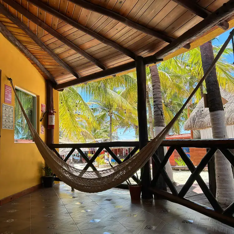 Relaxing terrace and cabin area at Squalo Beach Club