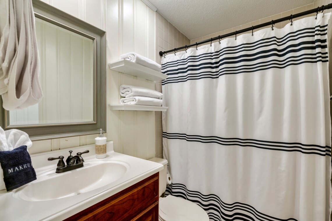 Secondary full bathroom on the main level