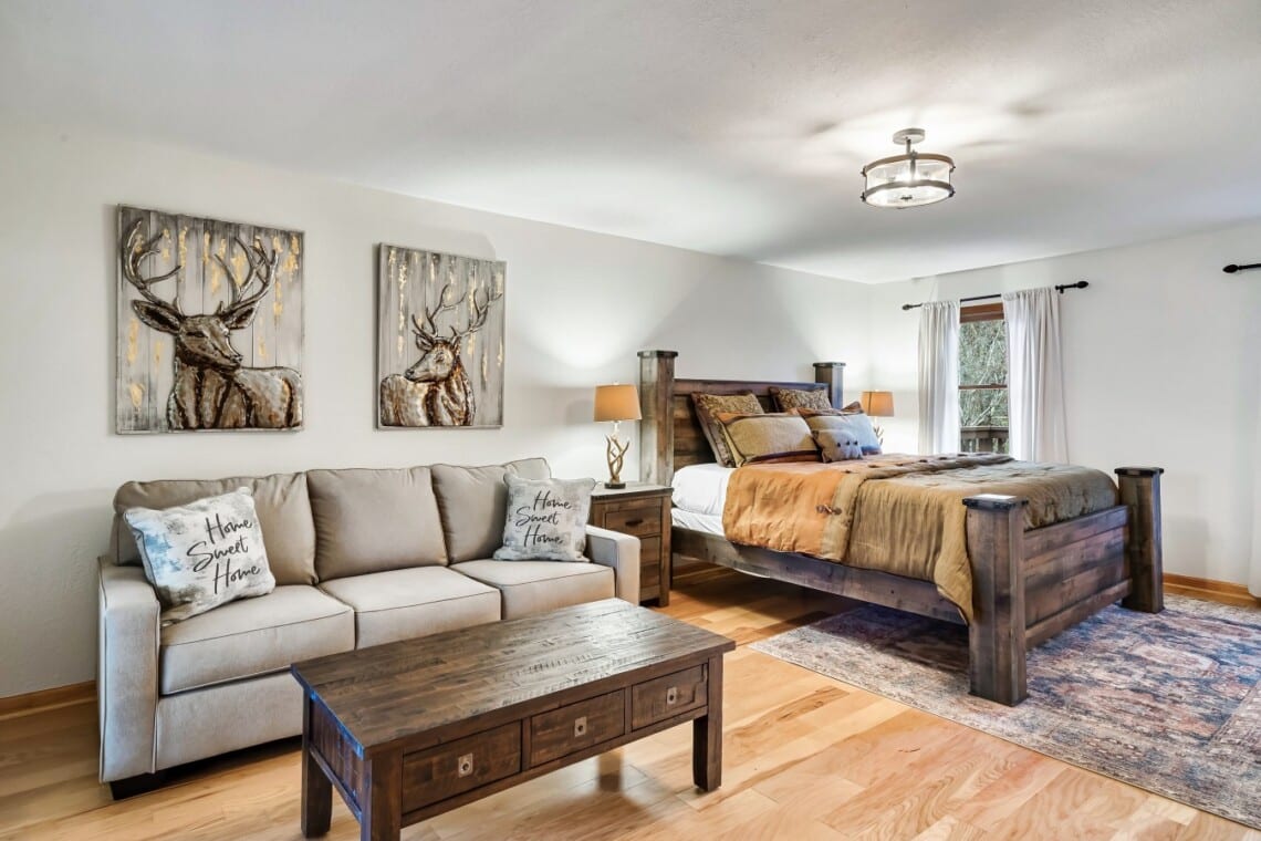 Relax in the King primary suite with ensuite featuring a cozy pull-out couch.