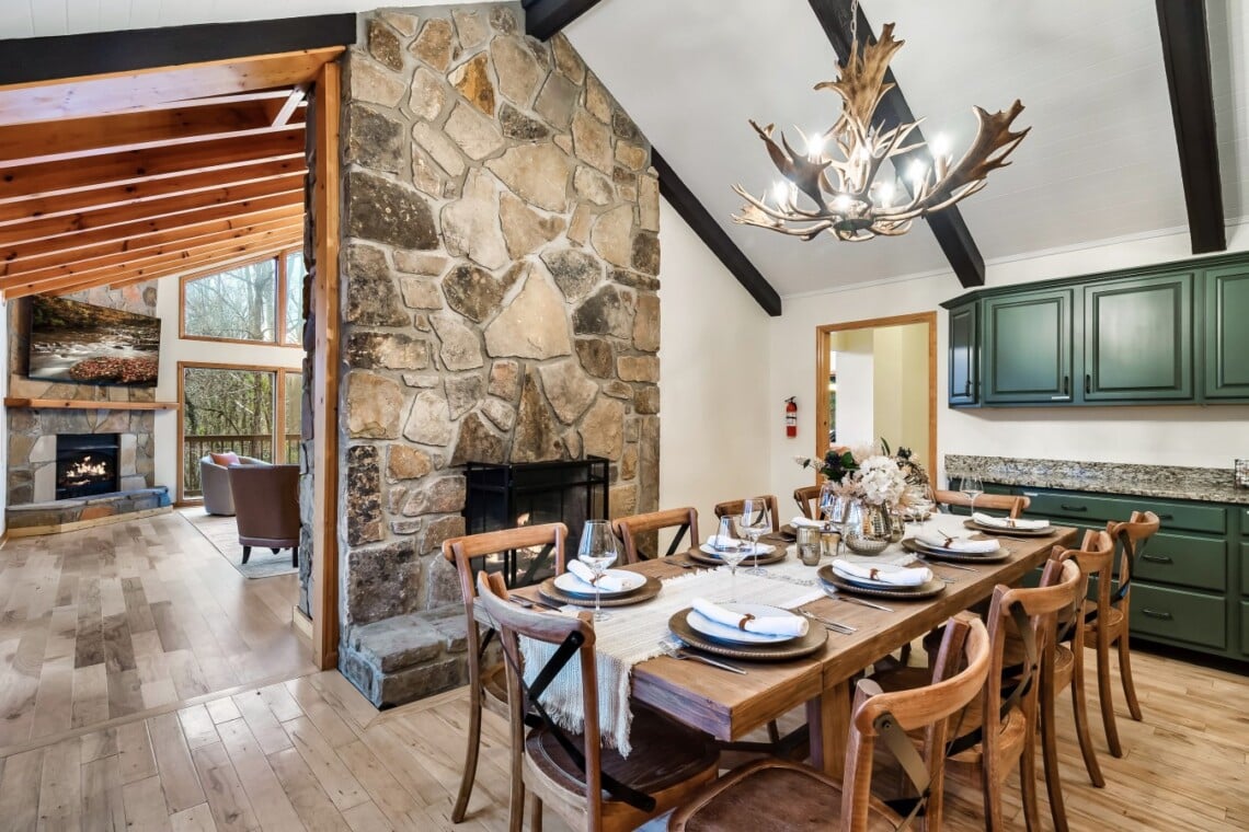 Ample dining space with seating for up to 14 between the kitchen and the dining area