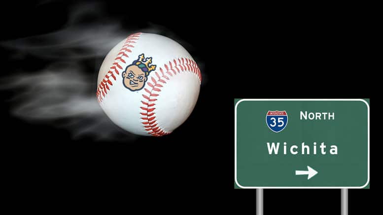 Baseball with a Wichita State Shockers logo and a highway sign for Wichita, Kansas.