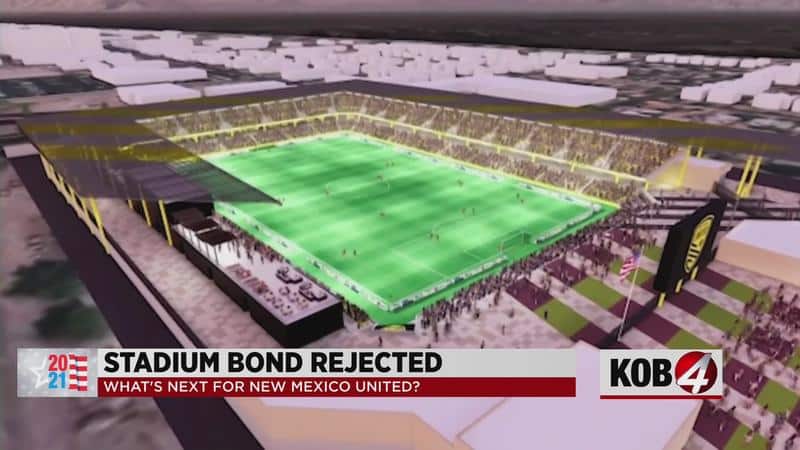 Stadium construction visualization with seating and field layout, aerial view of facility development.