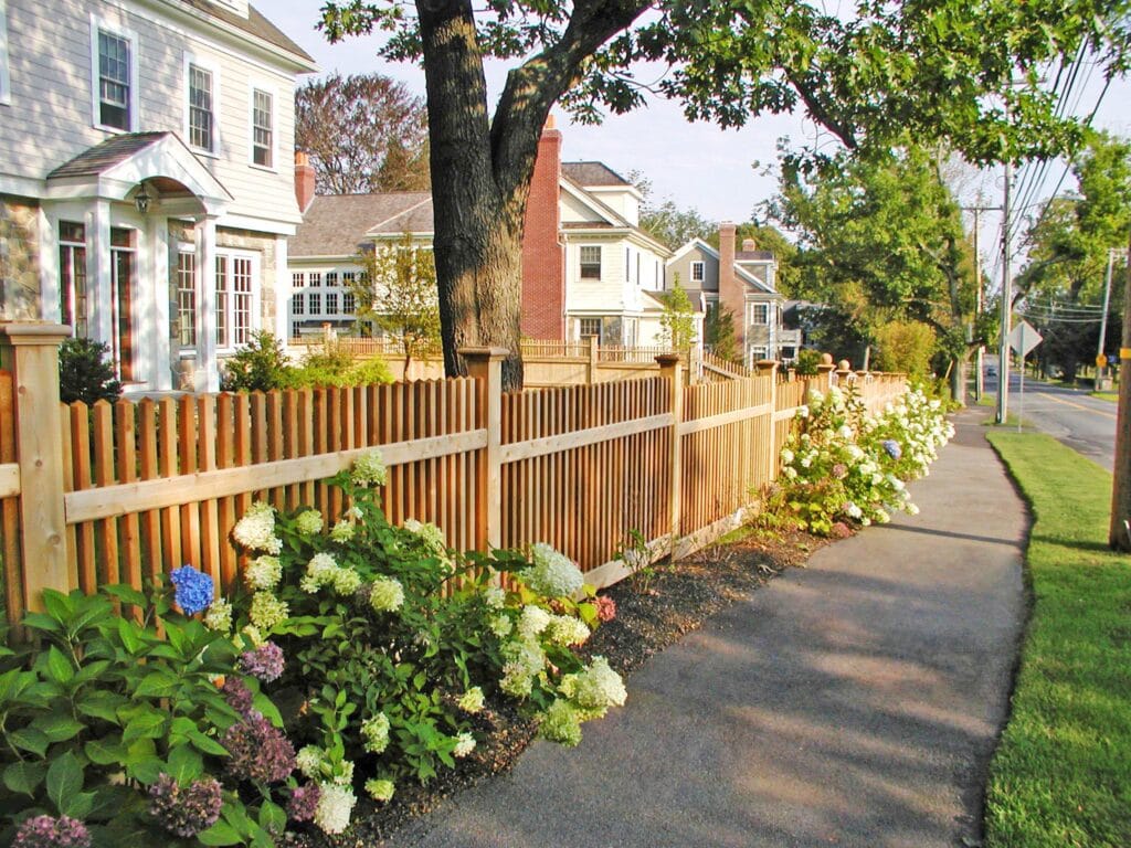 Stunning cedar fence graces front yard by Sudbury Cedar Fence Co, in Concord MA