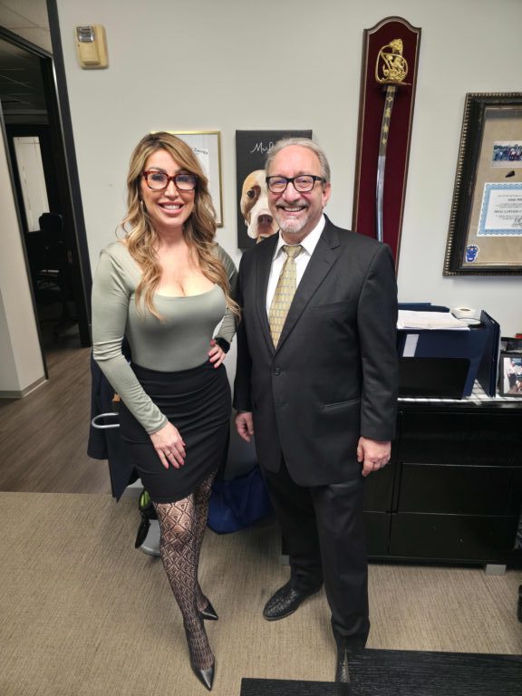 Adam H. Miller, The Texas Bulldog, with Houston social media personality Houston's LaLa at The Miller Law Firm office in Houston, Texas