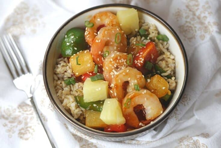 This Hawaiian Shrimp Rice Bowl is a flavorful and simple 30-Minute meal. Full of Polynesian flavors, this easy shrimp rice bowl is a winner. This quick and easy shrimp rice bowl recipe is an easy 30-minute meal the family will love. Try this rice bowl recipe today. Tasty shrimp pineapple bowl/