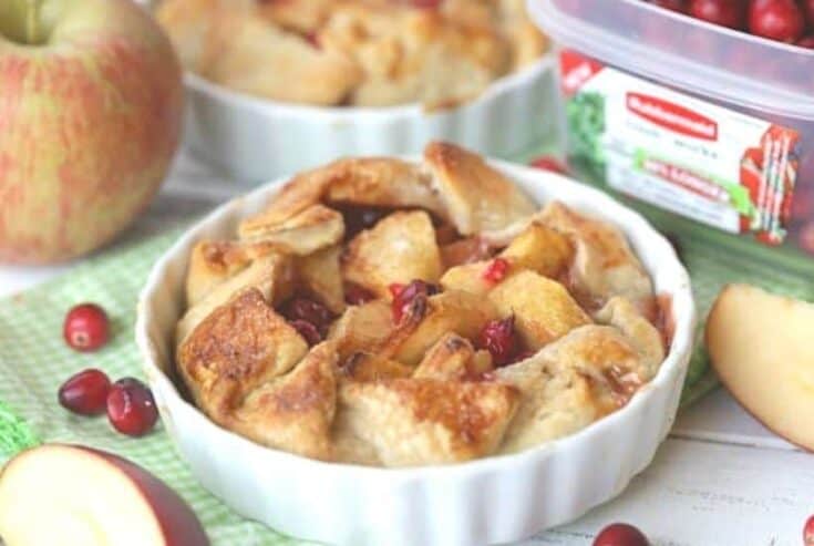 Sweet apples and tart cranberries collide to make these delicious Apple Cranberry Tarts. These mini apple pies are the perfect recipe for your fall celebration. This cran-apple pie recipe is perfect the perfect portion for dessert. Try this easy apple pie recipe.