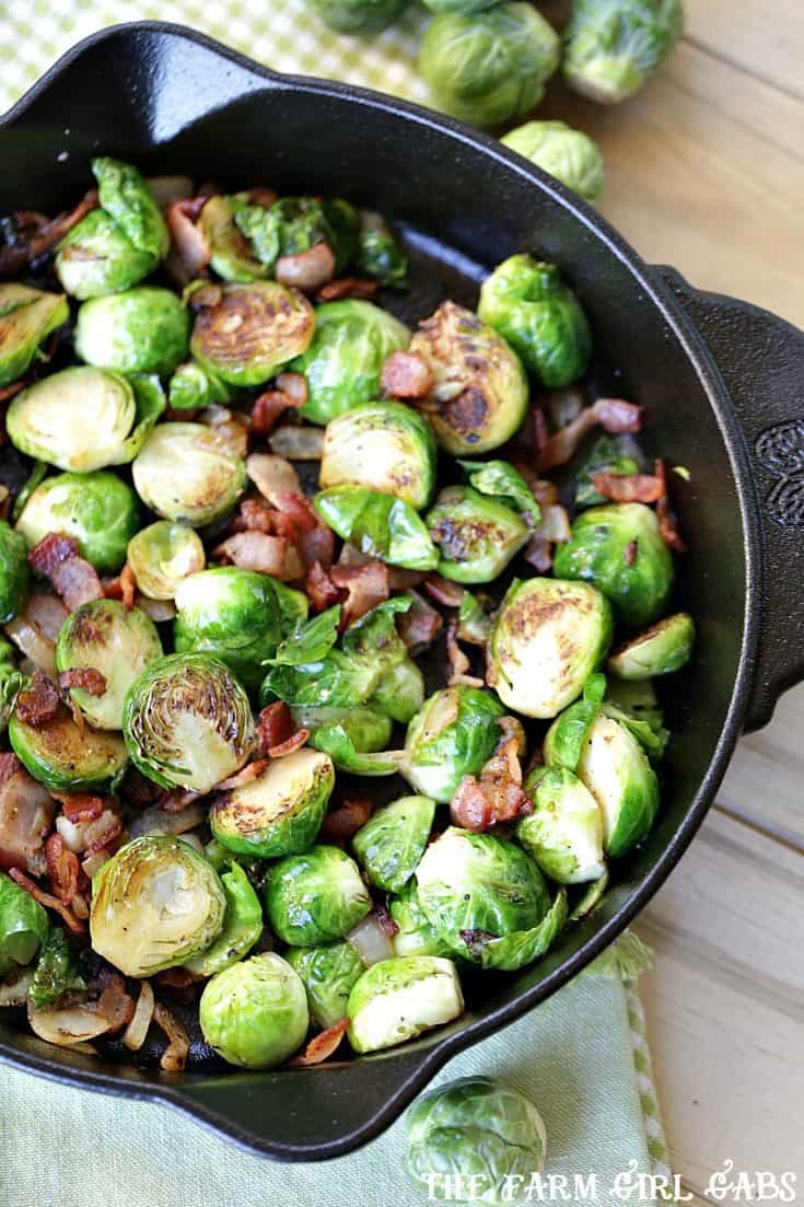 Pan Seared Brussels Sprouts With Bacon are a super quick side dish ready in 20 minutes flat! It's the perfect recipe to serve at Thanksgiving or for a weeknight meal. #SideDish #Recipe