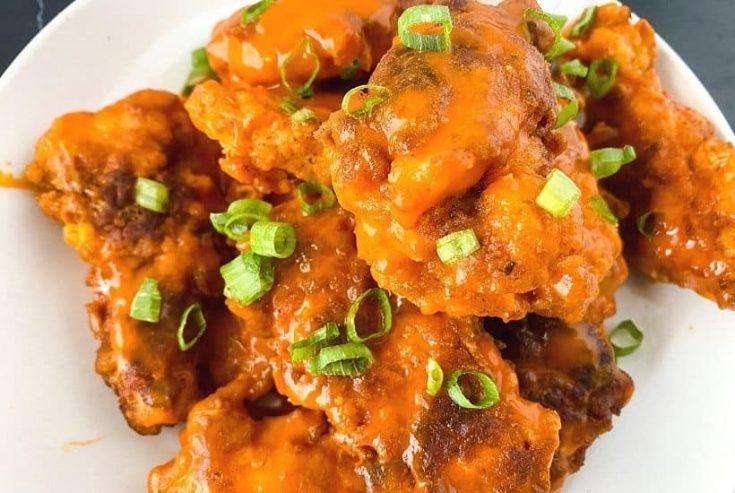 Easy homemade buffalo chicken tenders with ranch dipping sauce.