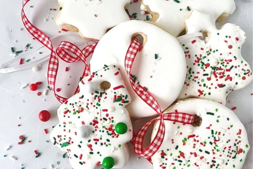 Learn how to make delicious cookies that look like decorative holiday ornaments with this recipe for Christmas Ornament Sugar Cookies. Not only do they look impressive, but they also taste amazing.