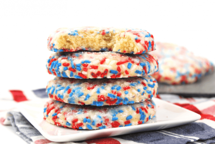 There is no better way to celebrate a day like July 4th than with some homemade red, white, and blue Patriotic Butter Cookies. Try this recipe for some of the tastiest, most flavorful baked cookies ever! This easy red, white and blue recipe is a delicious 4th of July Recipe. This classic butter cookie recipe is rolled in red, white and blue patriotic sprinkles.