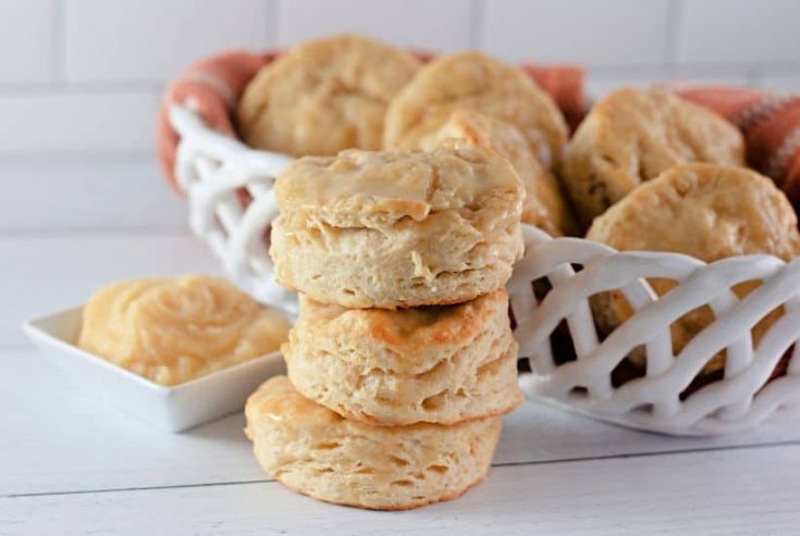 When craving light and fluffy biscuits, give this Honey Butter Biscuits recipe a try. They have the perfect taste and texture, pairing perfectly with all kinds of flavorful meals. These soft and flaky buttermilk biscuits are brushed with homemade honey butter.