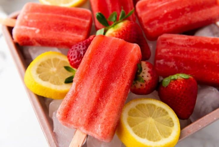 Cool down on a warm summer day with these refreshingly delicious Strawberry Lemon Popsicles. They’re fruity, flavorful, and naturally good for you. This easy popsicle recipe is a great treat for kids and adults.