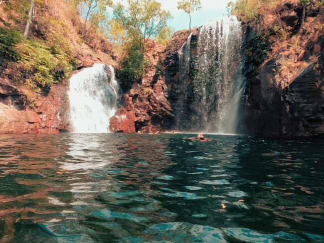 Twin waterfalls in Litchfield plunging into a natural freshwater pool, one of the top things to see in a Litchfield itinerary
