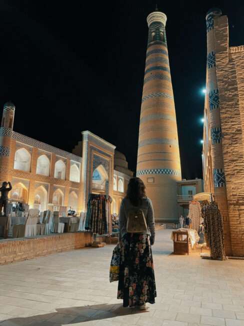 view of minaret at night in khiva uzbekistan