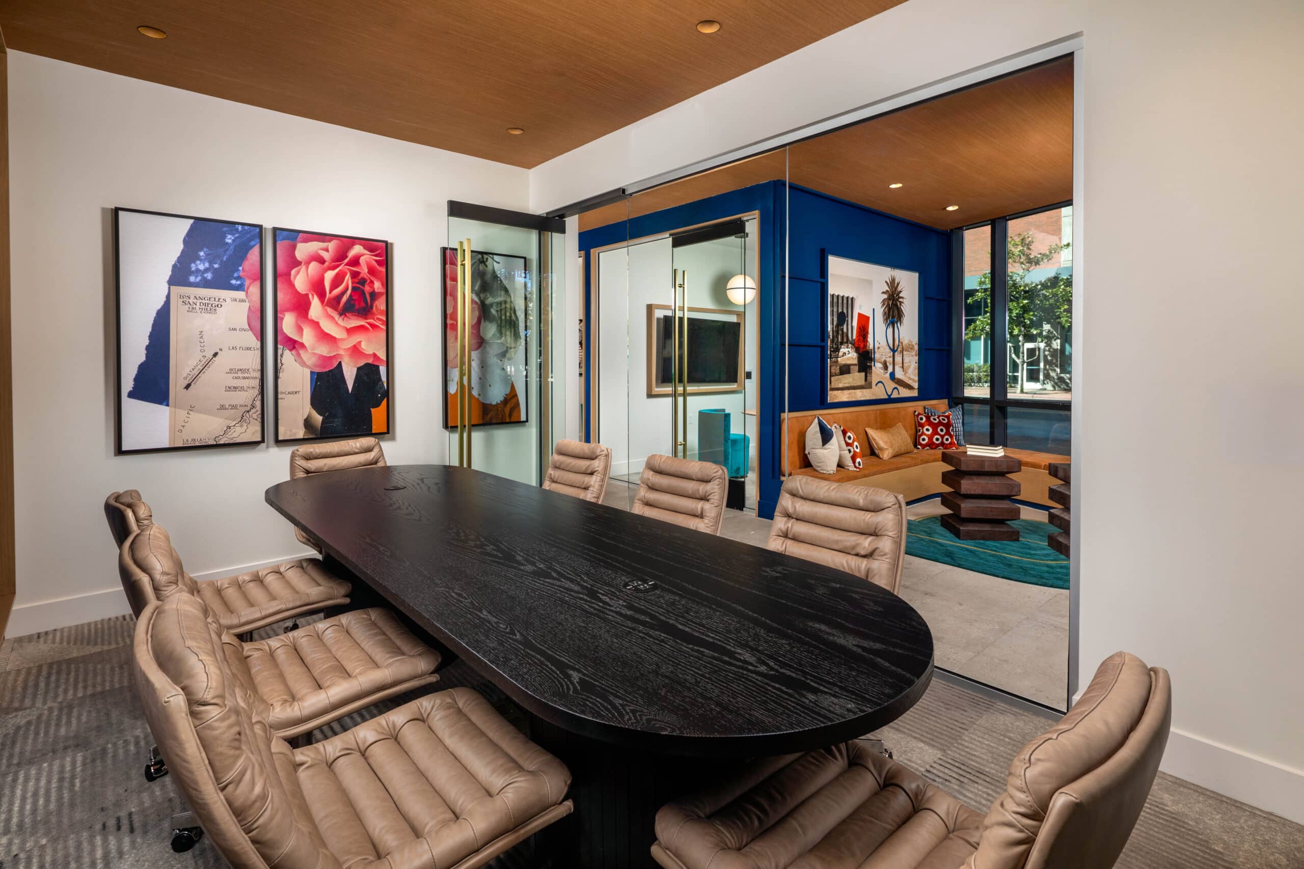 An office room with a table and chairs at The Wyatt San Diego, CA apartments.